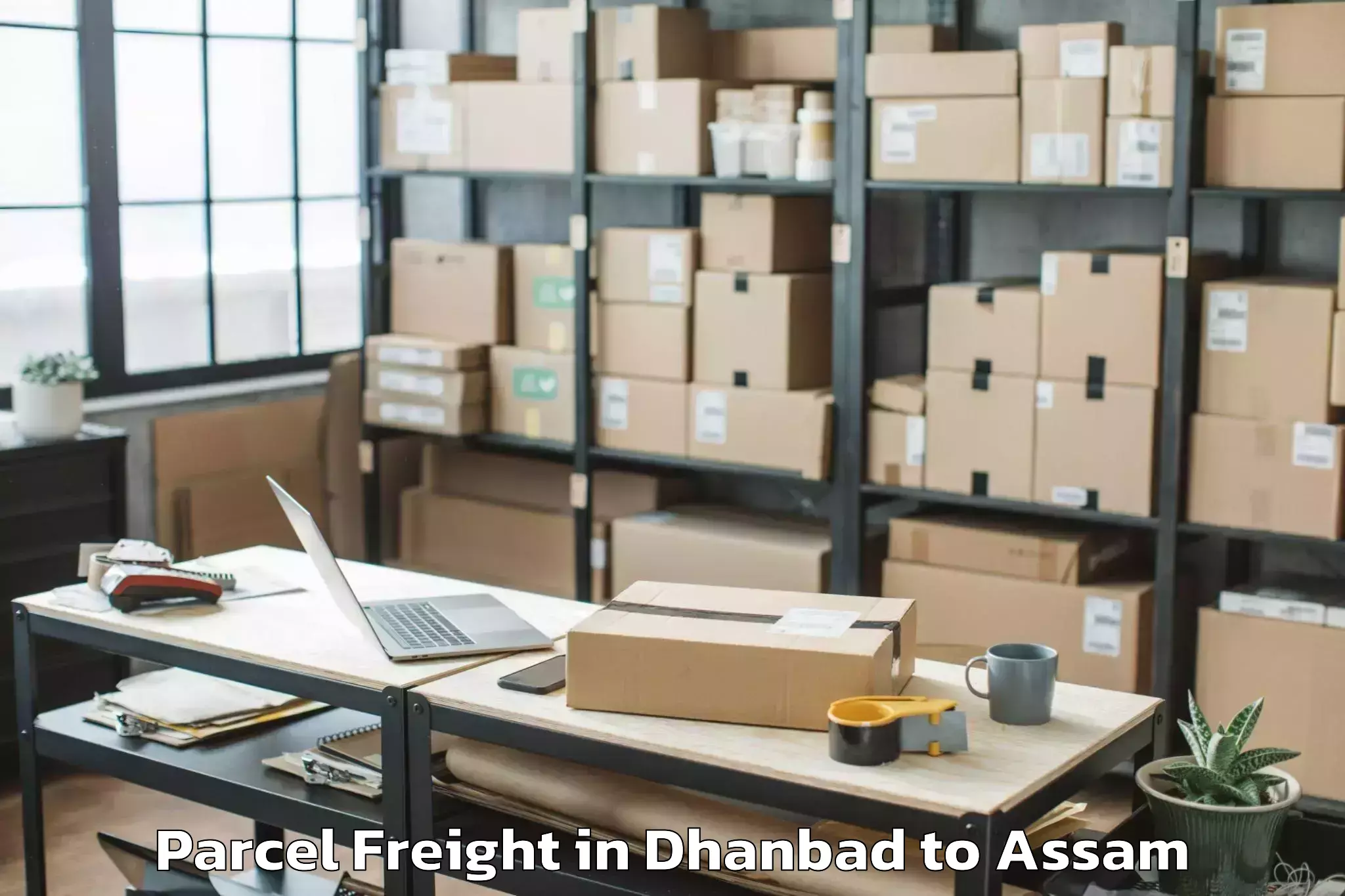 Leading Dhanbad to Sonapur Parcel Freight Provider